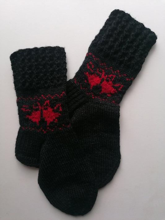black socks with Christas bells pattern
